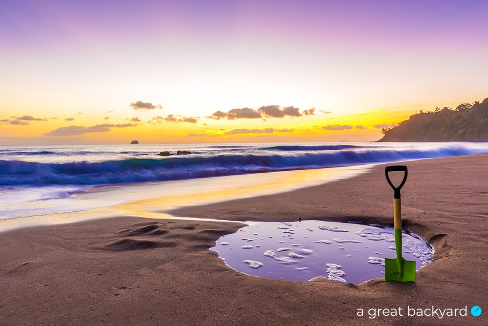 View of spade in pool on the beach at Hot Water Beach, New Zealand