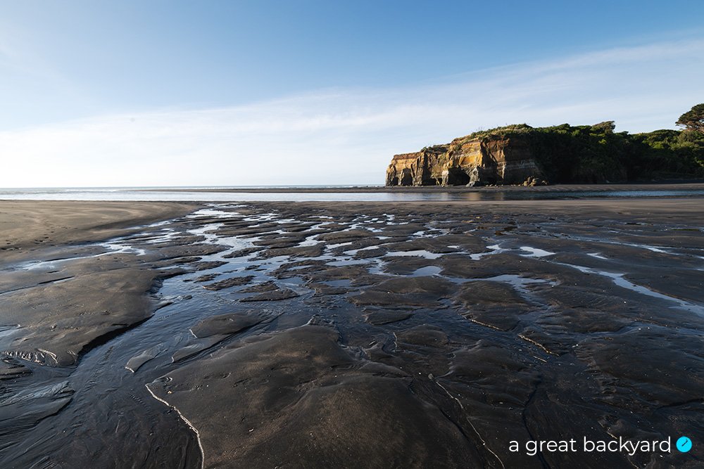 Tongaporutu beach at low tide by Corin Walker Bain | a great backyard print studio New Zealand