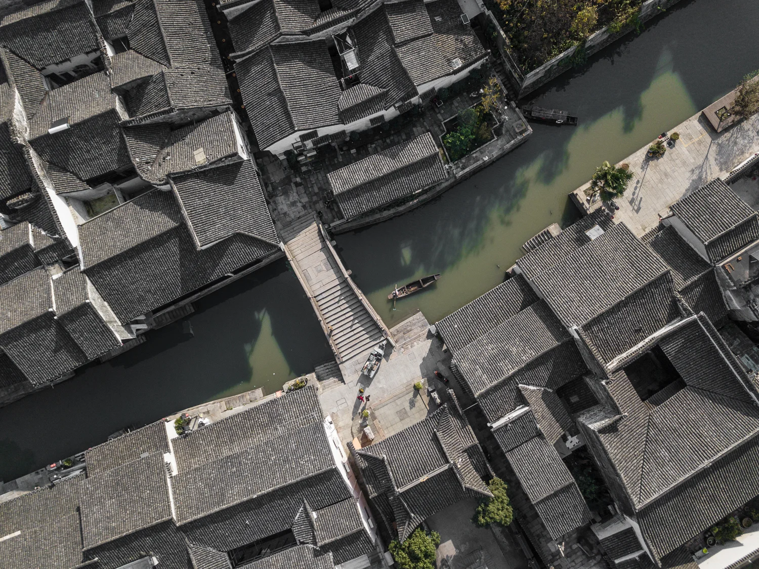 A small local branch of the Jing-Hang Canal as it flows through Deqing, China.