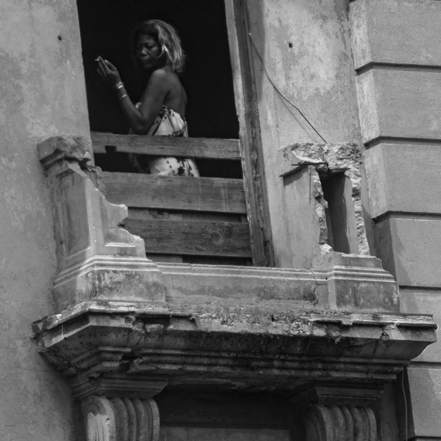 woman-smoking-balcony.jpg