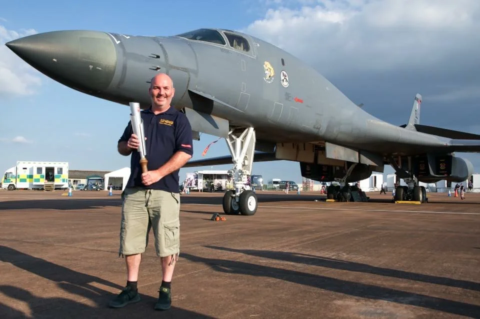 Me holding the RAF 100 ceremonial baton.