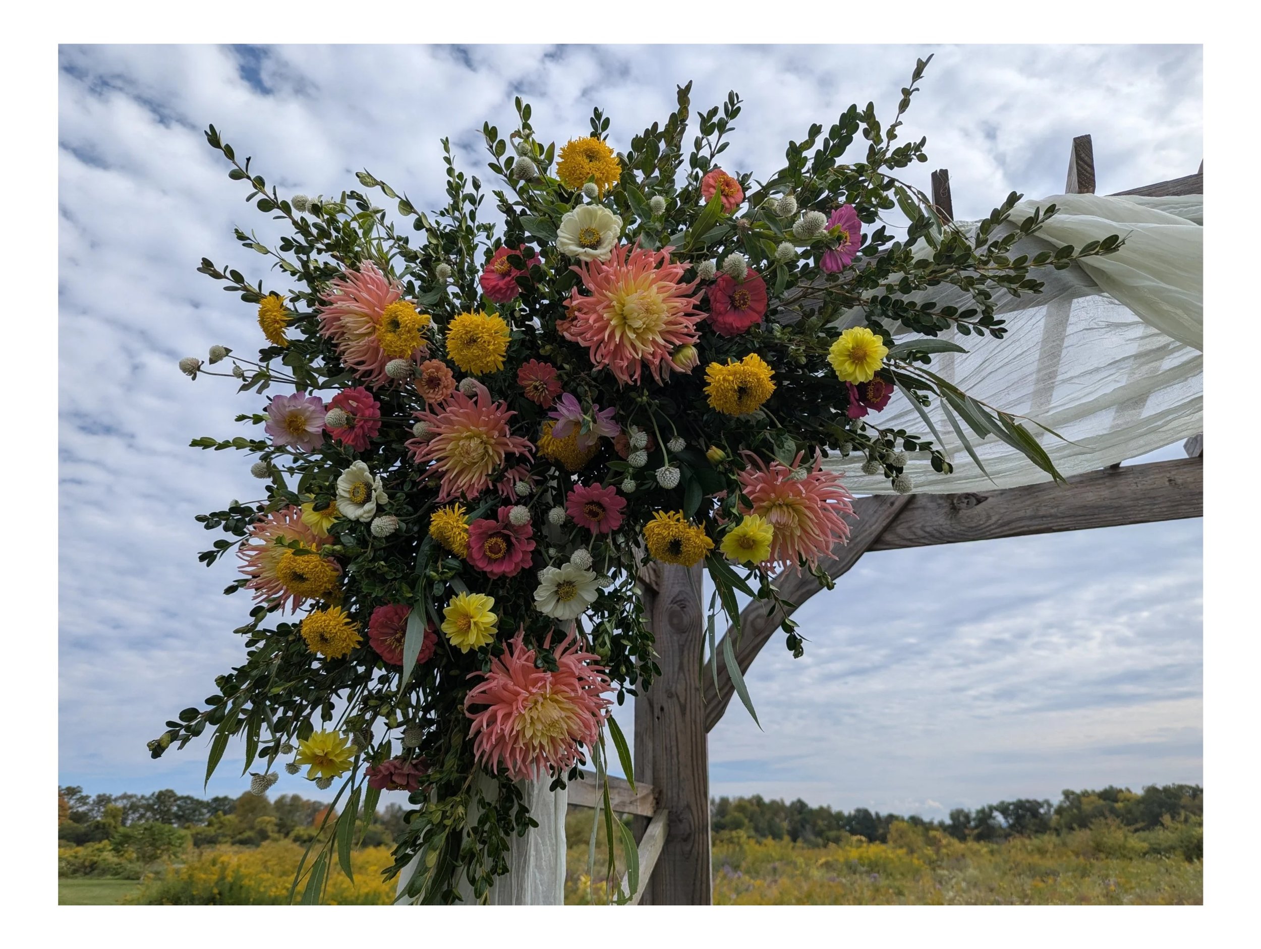 finger lakes wild flower wedding arbor