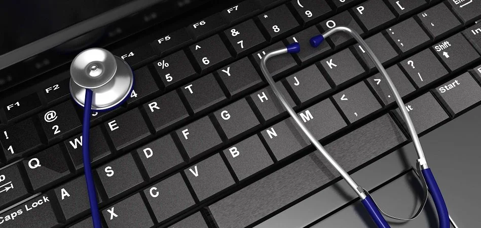 0914_stethoscope_on_laptop_keyboard_for_diagnosis_stock_photo_Slide01.jpg