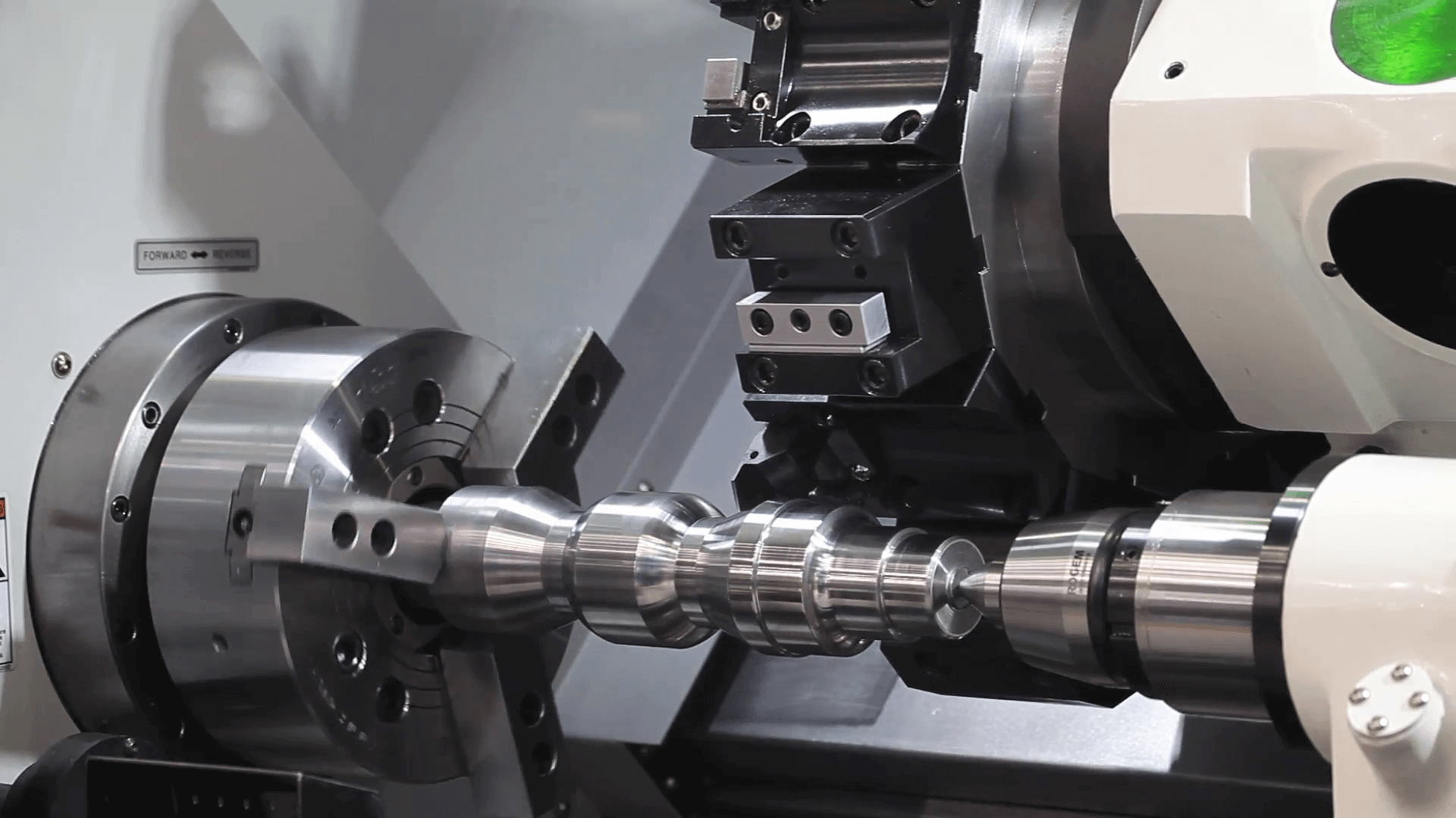 cnc-lathe-turning-center-close-up-processing_hd_8q8ir__F0000.png