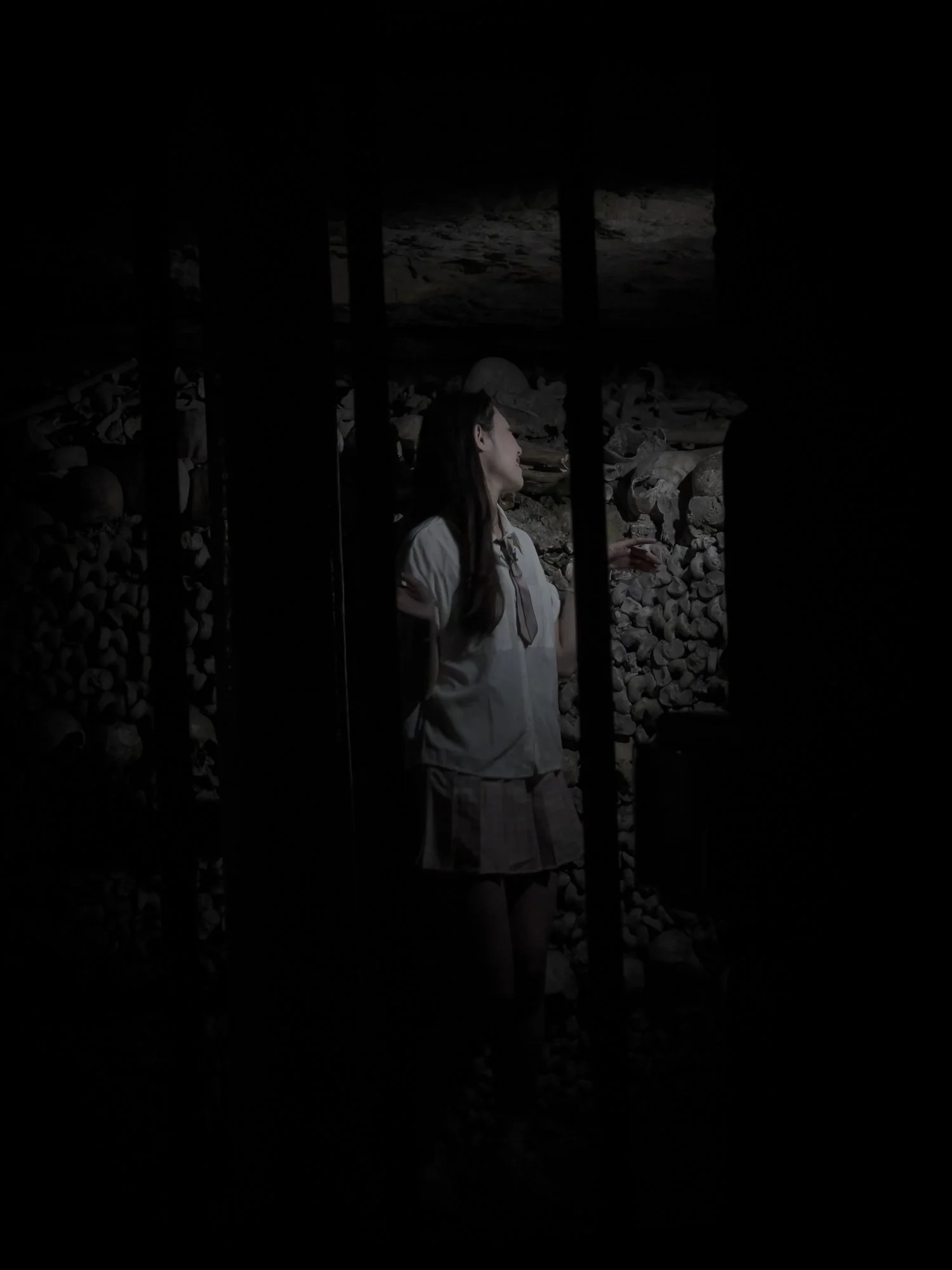 Girl in Catacombs 1.jpg