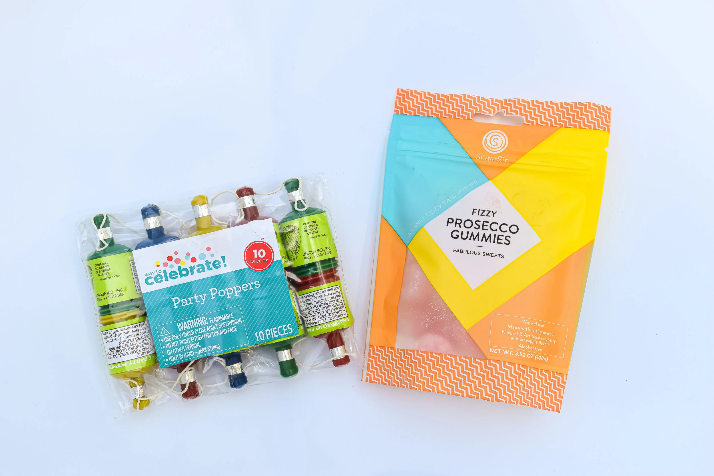 Why not add to the celebratory feeling by including prosecco gummies and confetti party poppers? You all, Ribbon and Twine Design basically had me as soon as they sent me a photo of the prosecco gummies. They know my weakness.