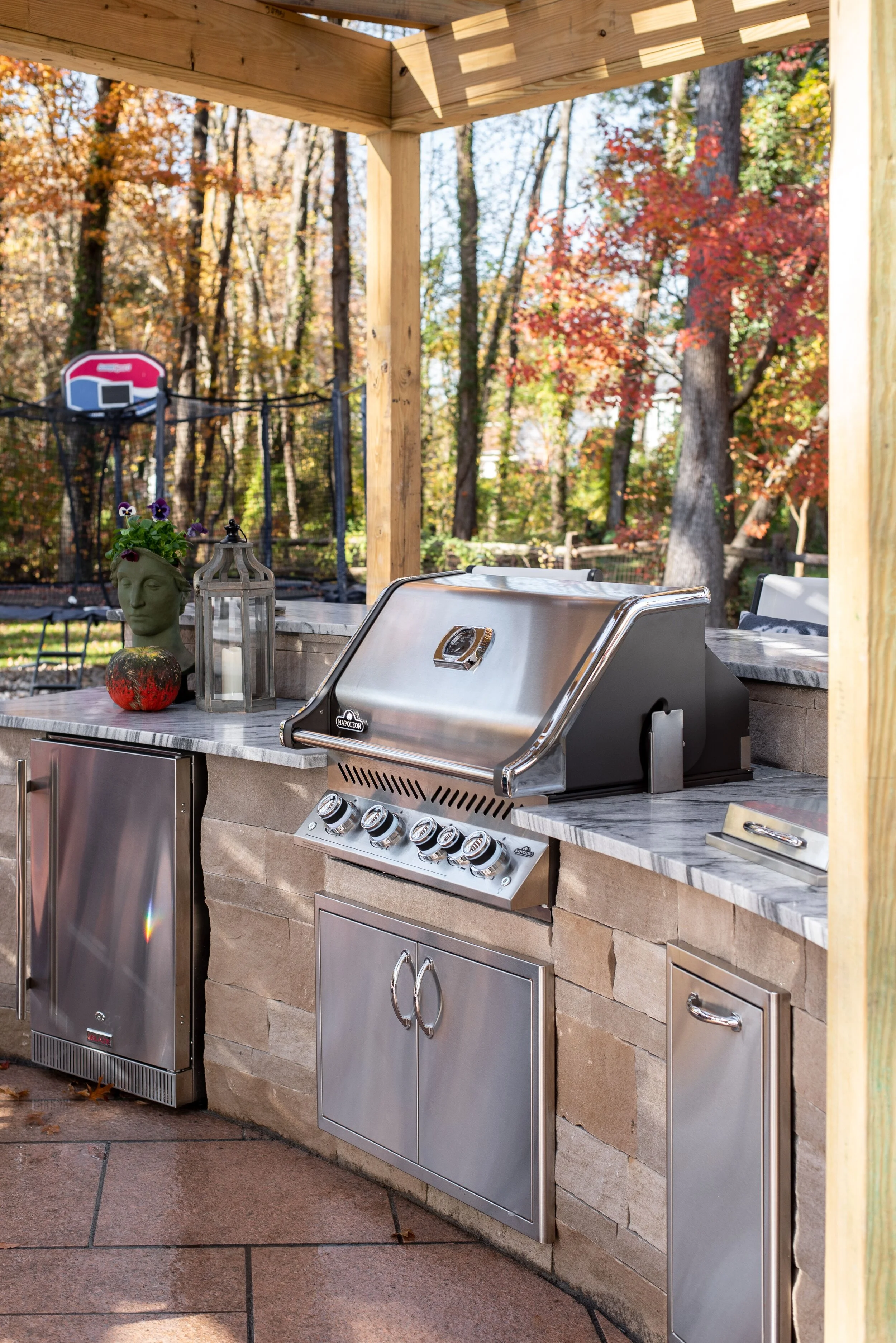 Its been a long time since I’ve seen my husband so excited about something but this outdoor kitchen did the trick! A fridge for our wine, beer and juice boxes, a kick ass grill, side burner, trash can and a bar counter is perfect for entertaining ev…