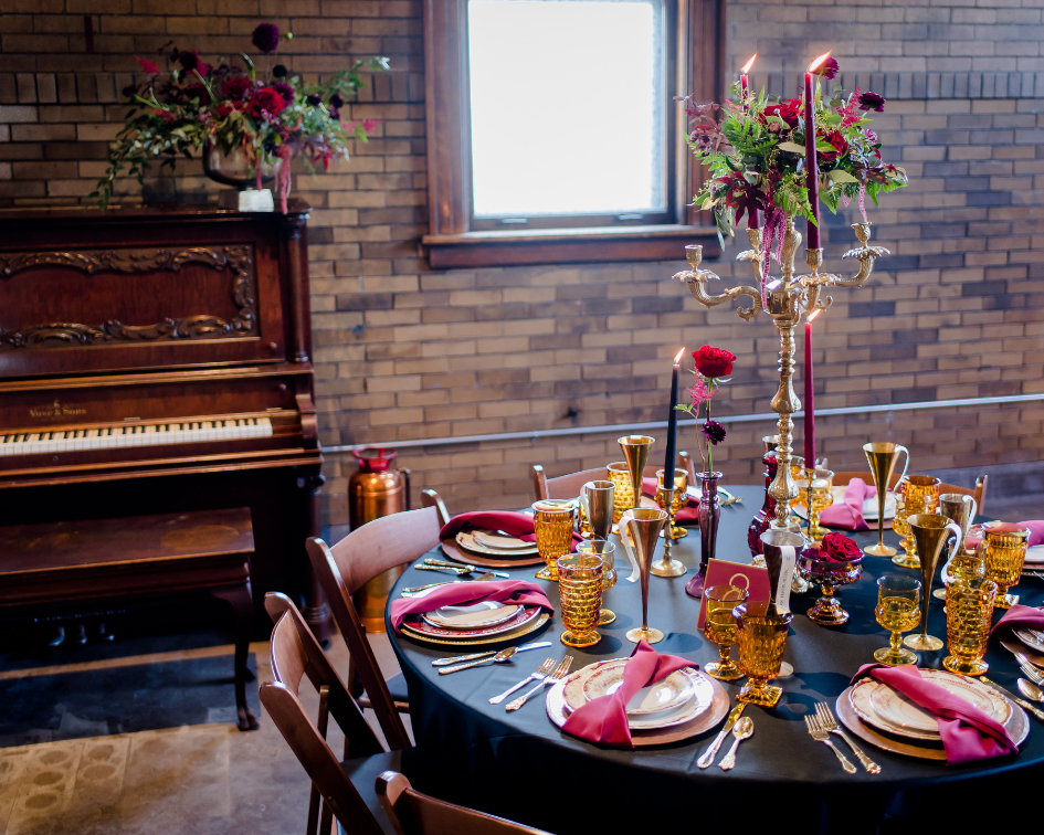 Burgundy black and burnt orange guest table from a gatsby themed wedding at Storyhill Firehouse in Milwaukee, Wisconsin - Planned by Natural Elegance LLC and photographed by Reminisce Studio.png