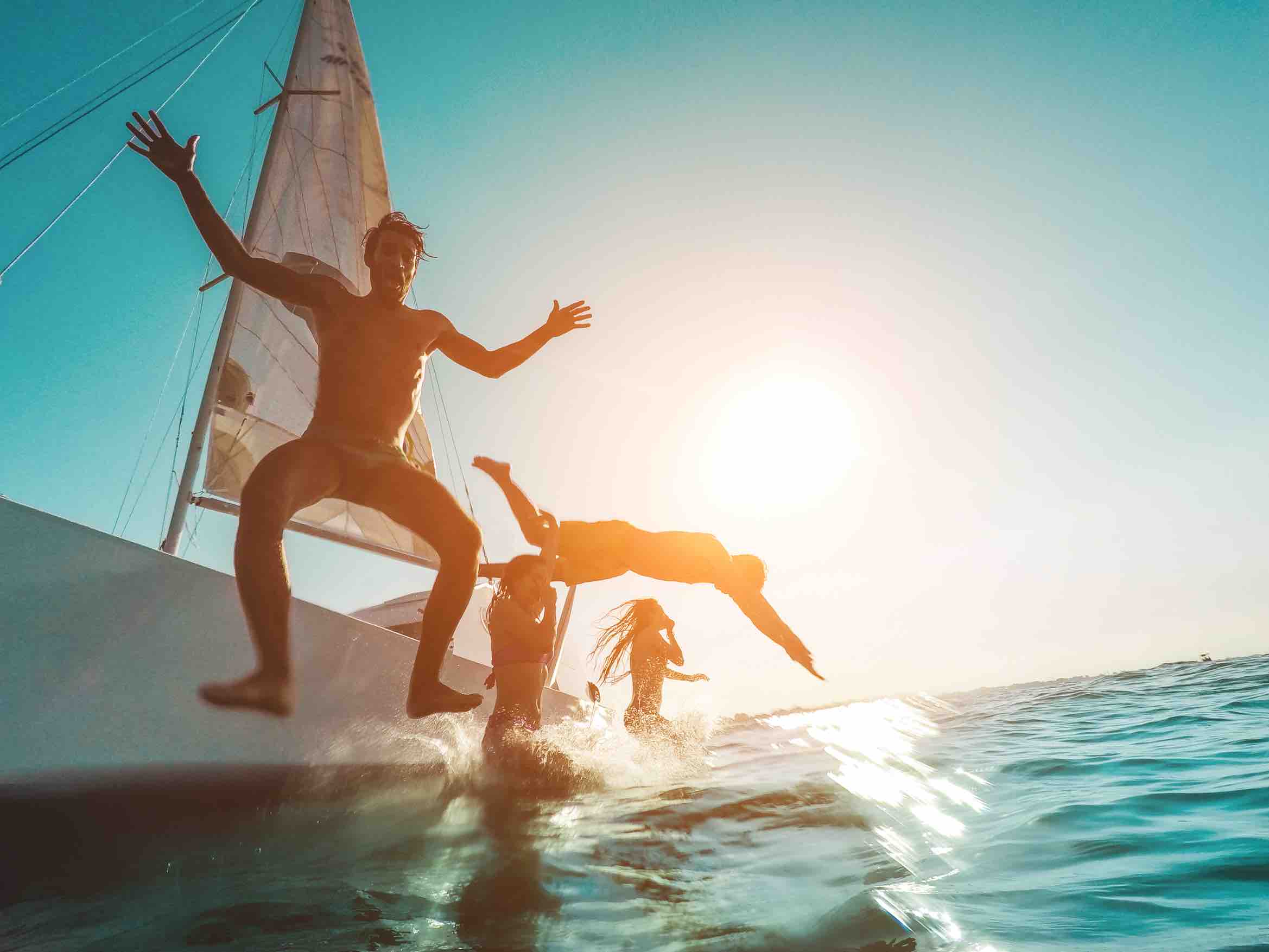 friends jumping in the sea.jpg