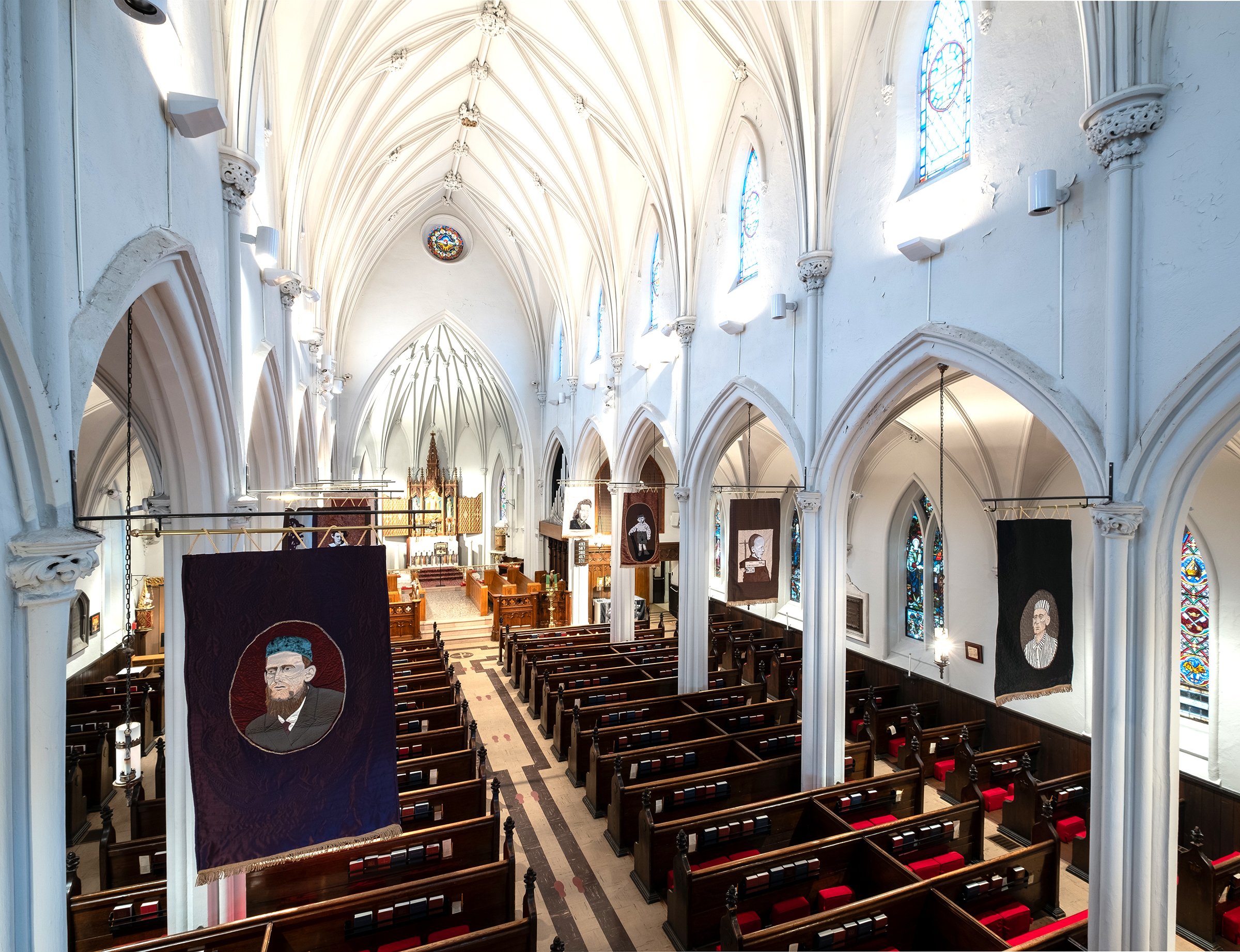 view of the banners hanging at christ church, photo michael del rossi