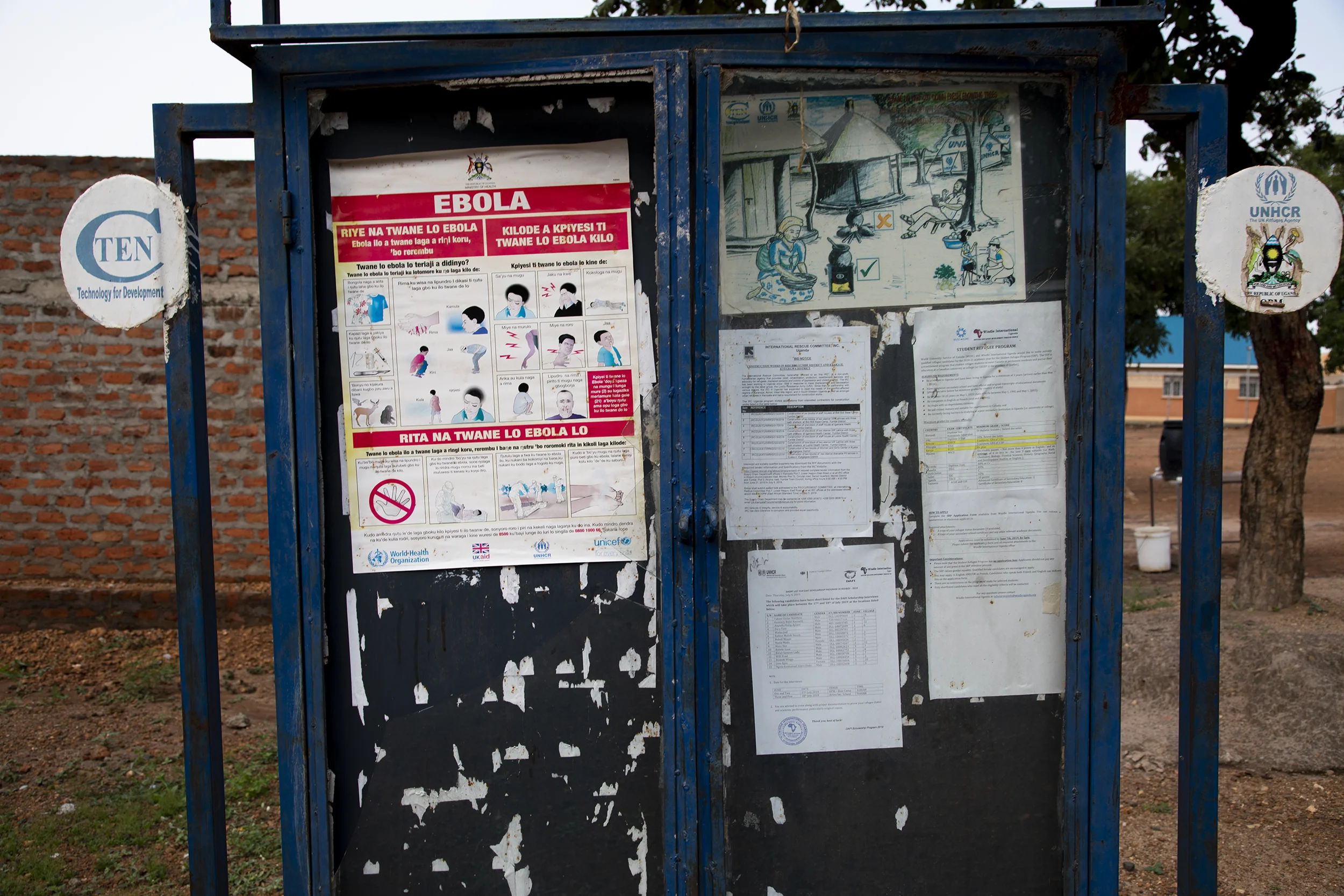 An Ebola warning poster is pinned to a noticeboard in Bidibidi Refugee Settlement. The Ebola virus has now been reported in southern Uganda.