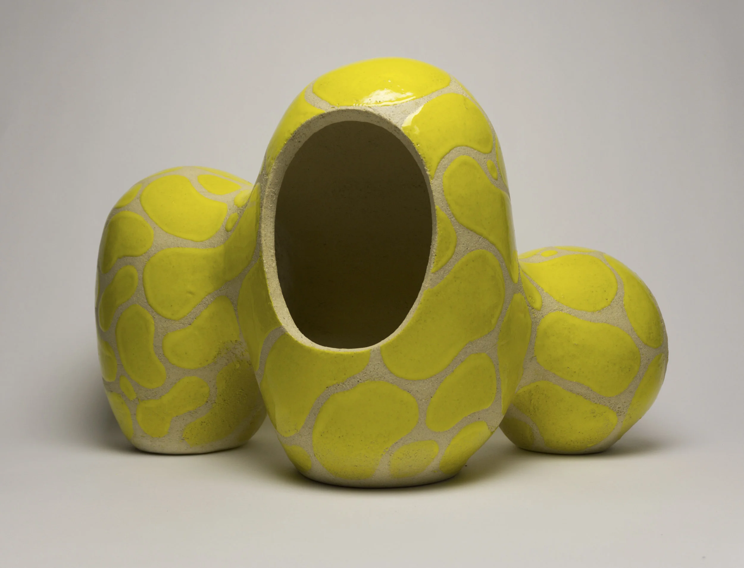  stoneware with yellow glaze pattern, h.12” x w.16” 