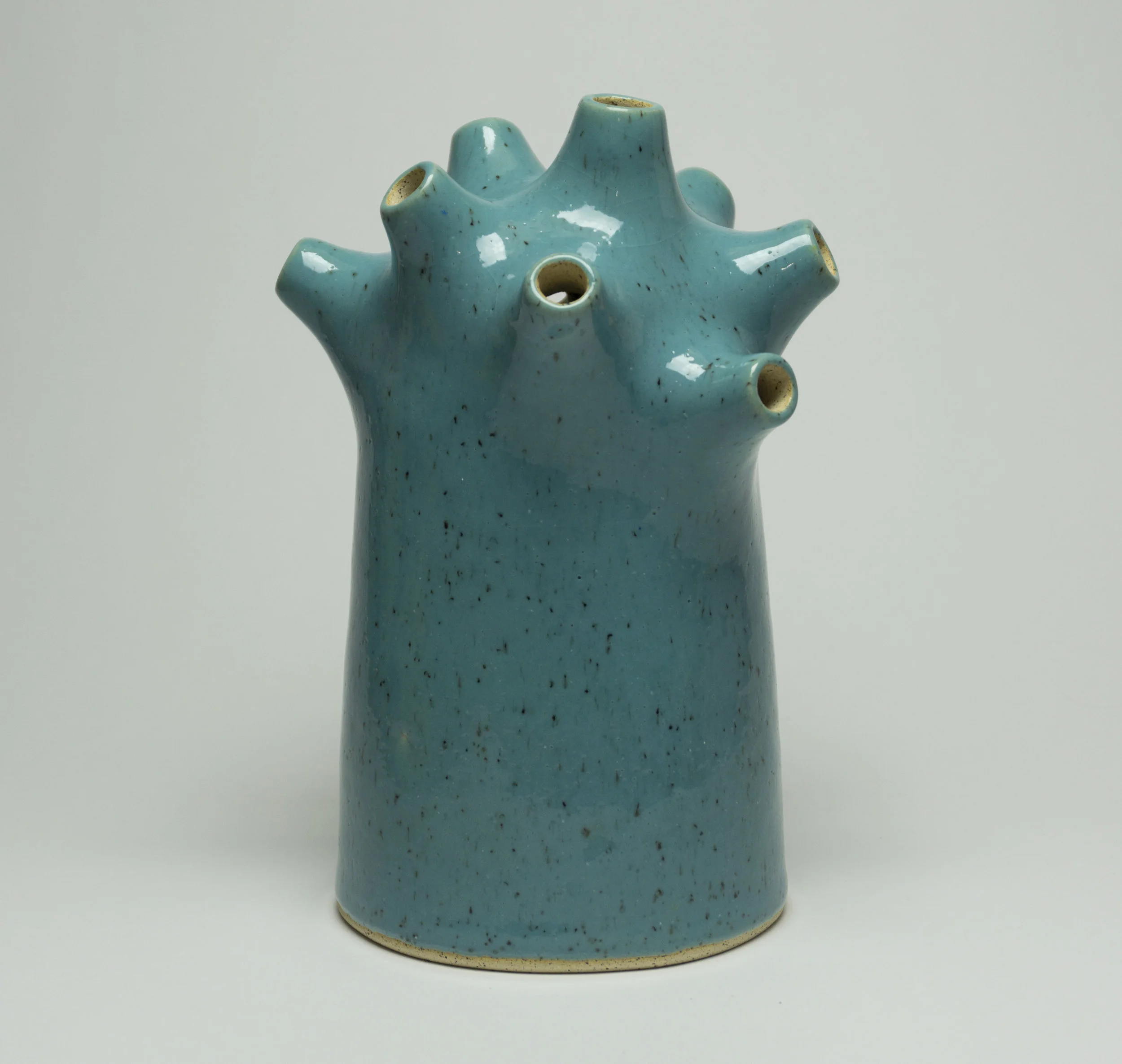  stoneware with glossy cyan glaze,  h.10” 