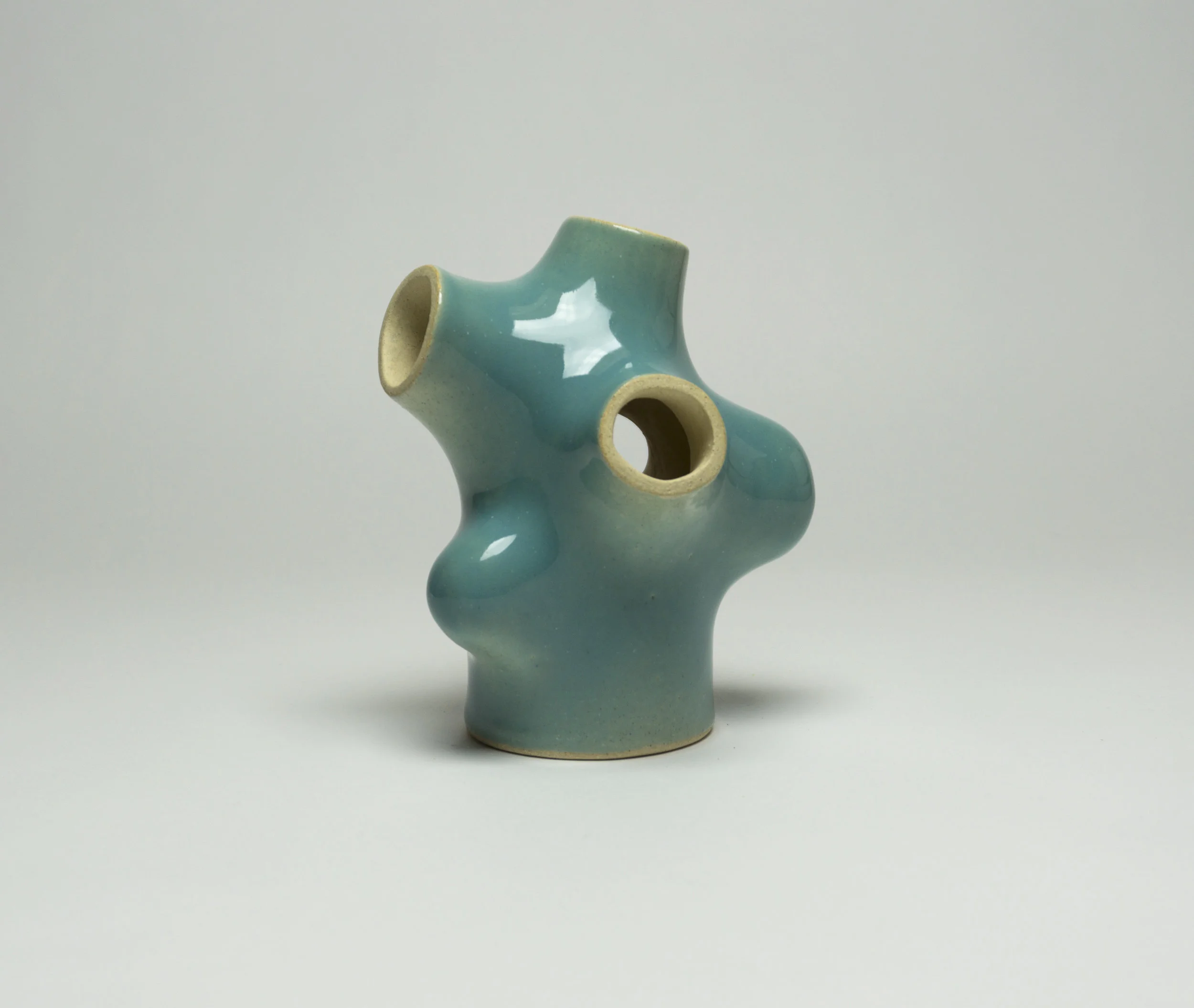  stoneware with glossy turquoise glaze, h.6” 