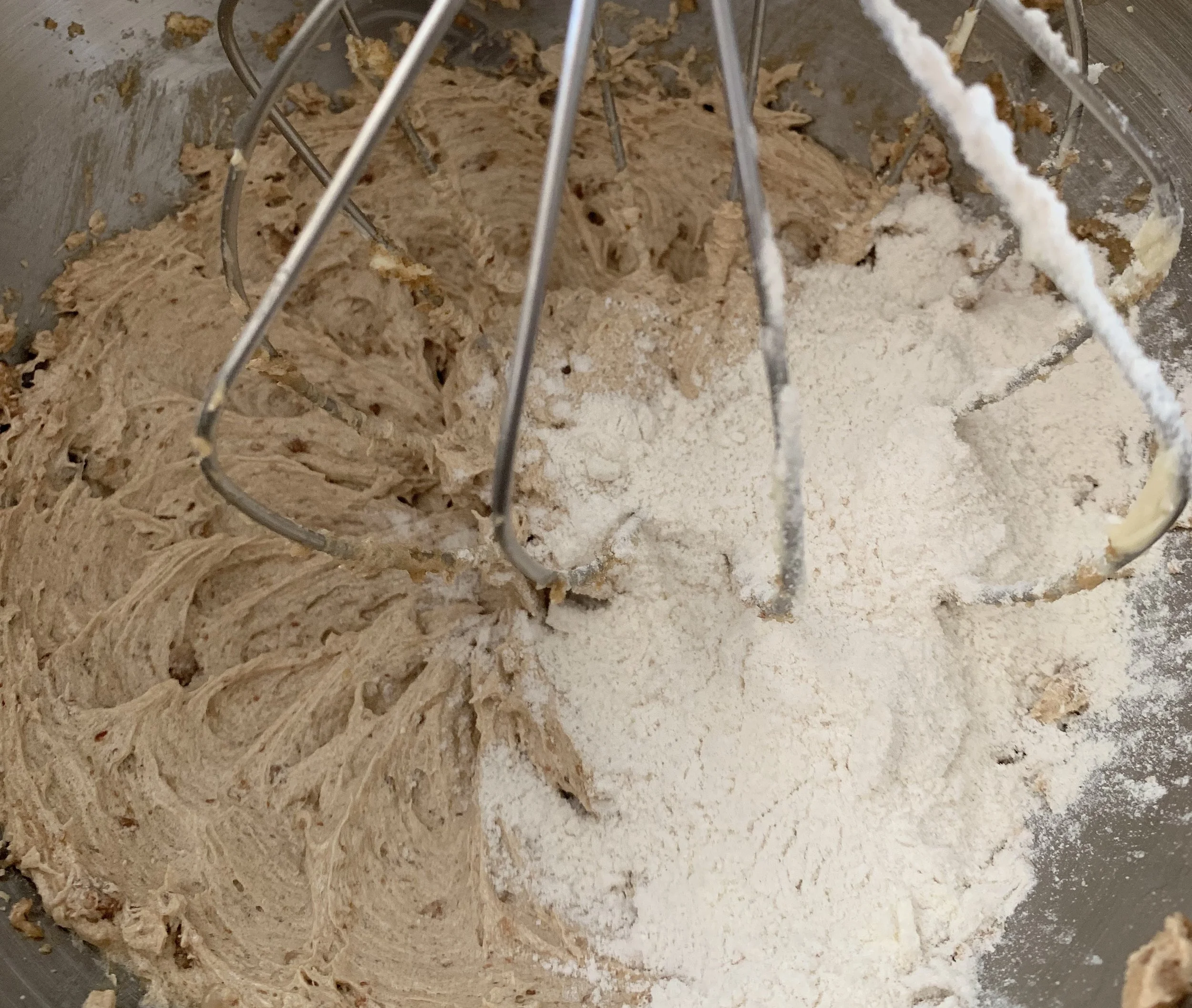 Added the dry ingredients slowly so it had plenty of time to incorporate and stay fluffy.