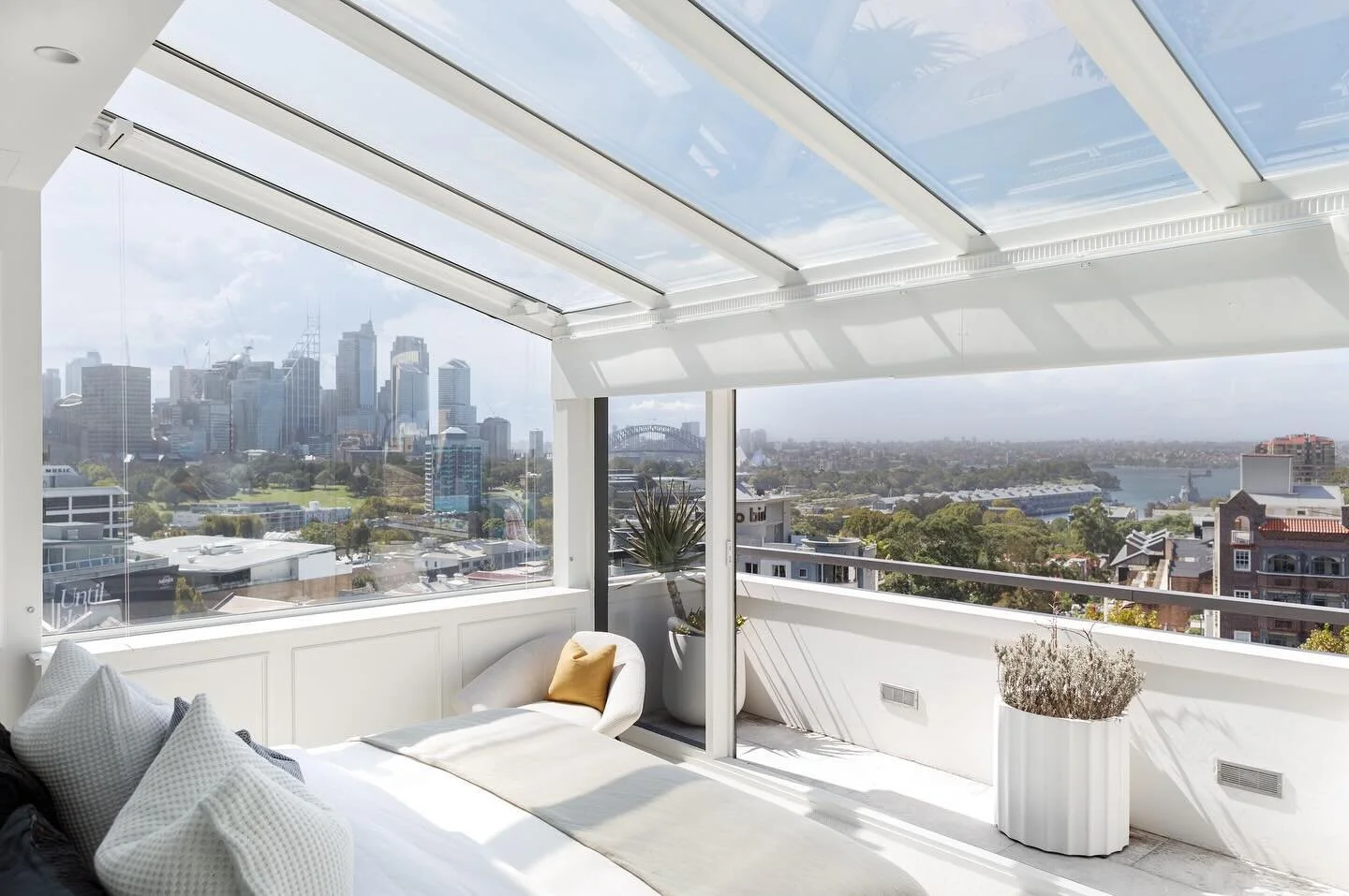 ROSEBANK RESIDENCE &bull; MASTER BEDROOM
.
Ascending to the upper level, the master bedroom epitomizes luxury living, offering a one-of-a-kind experience akin to an eagle&rsquo;s nest with a glass ceiling, providing an immersive view of the city skyl