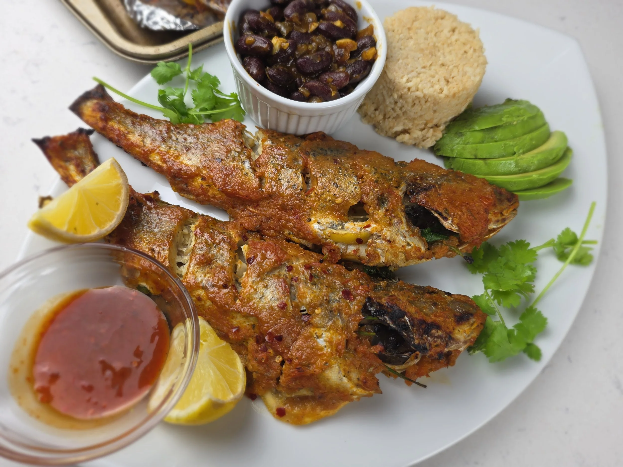 Roasted Croacker Fish with Muto Sauce (Zimbabwean-Style)
