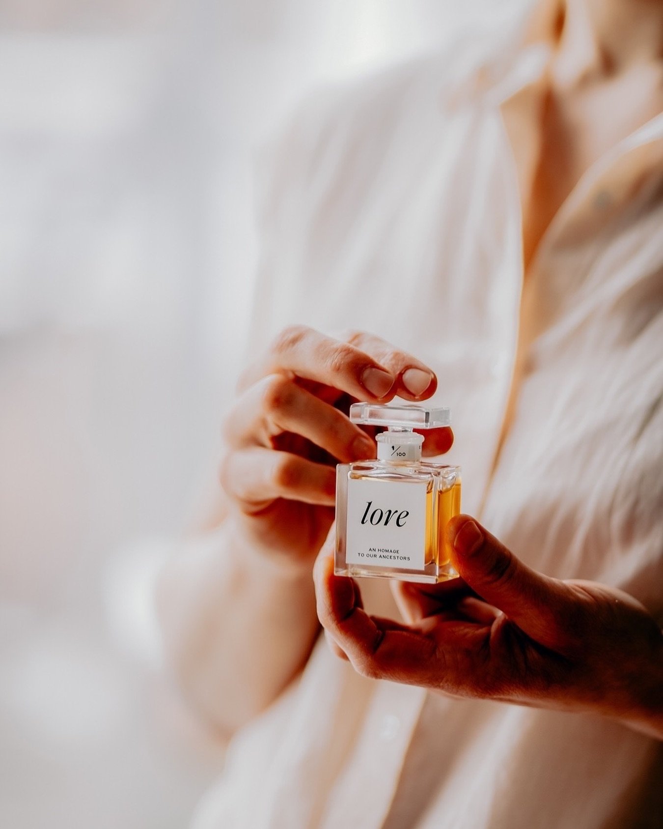 Lore ~ a scented love song to grace, elegance, and ancestral connection. A sacred blend resonating at the finest frequency, crafted from premium essential oils in organic jojoba oil, and activated with rose quartz crystal energy. Experience the uplif