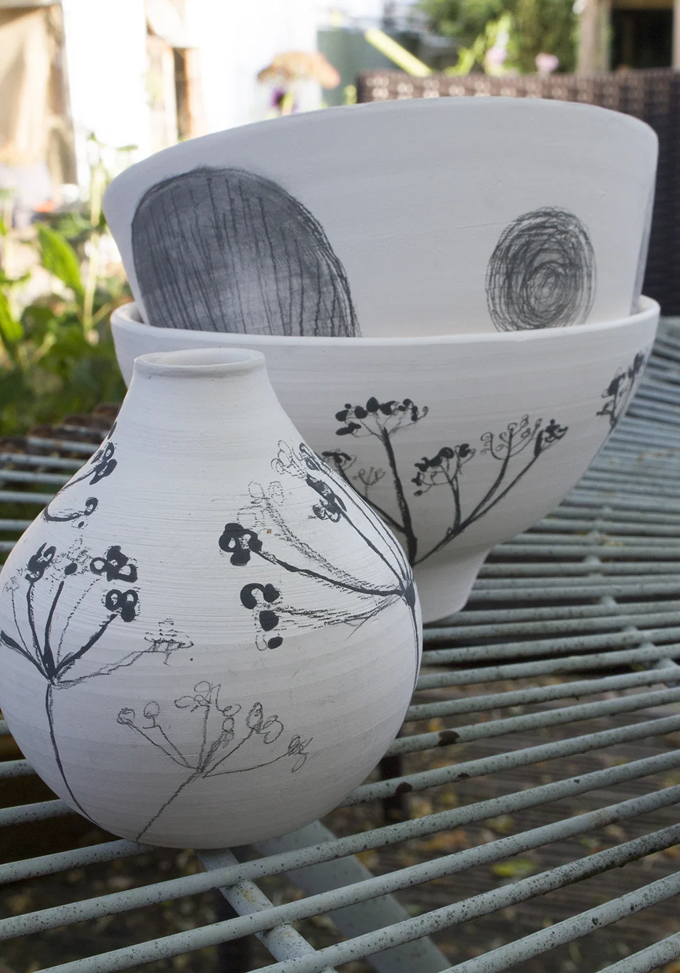 Biscuit-fired pots