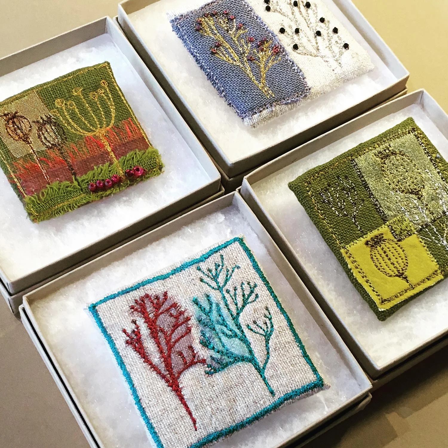 Art Brooches in boxes.jpg