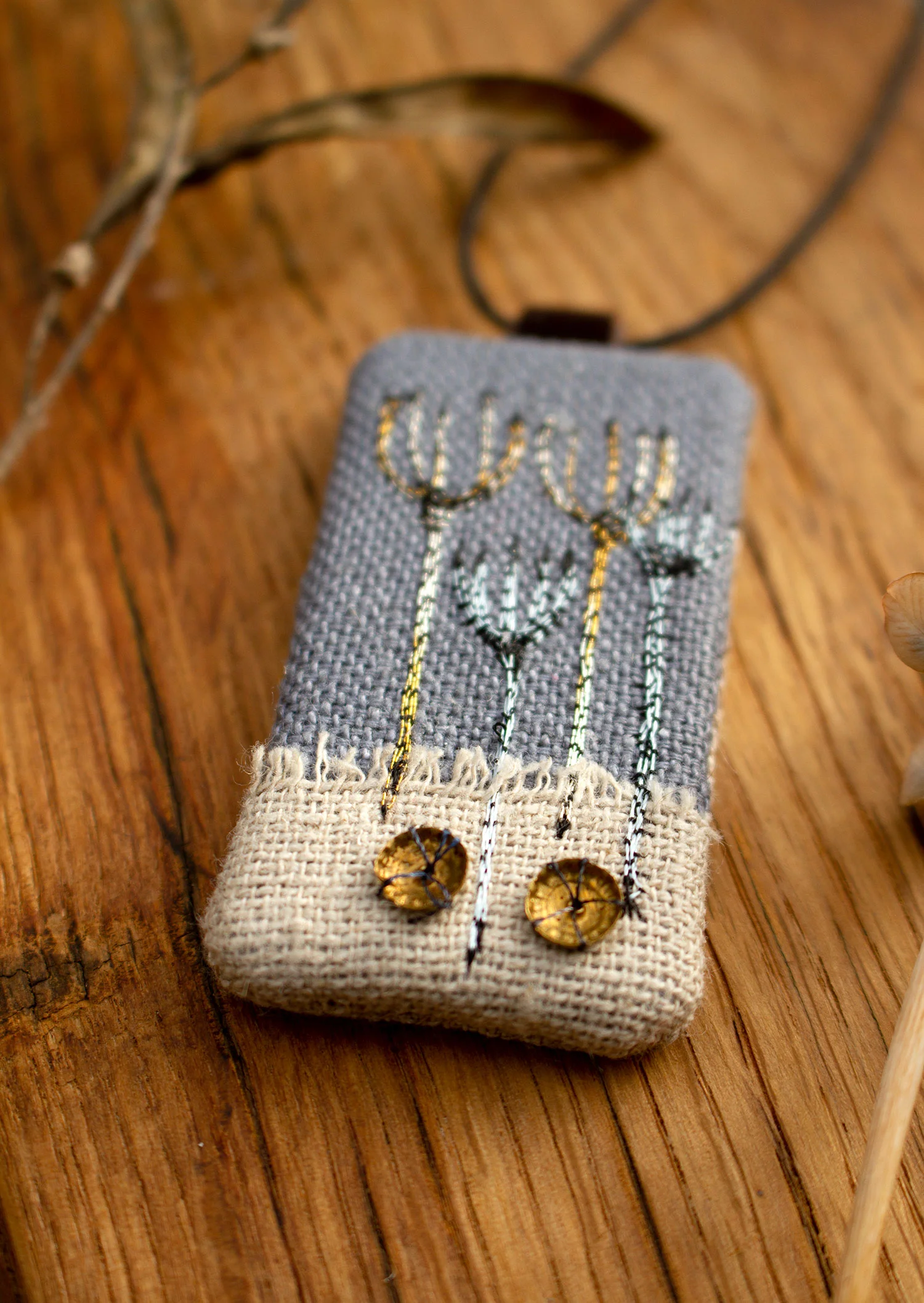 Necklace Seed heads on grey.jpg
