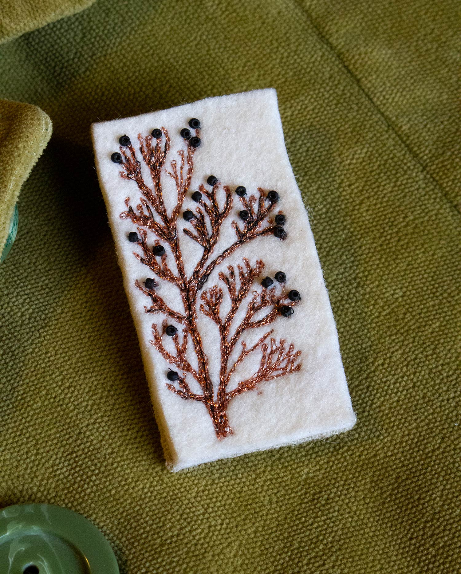 White and copper brooch coat.jpg
