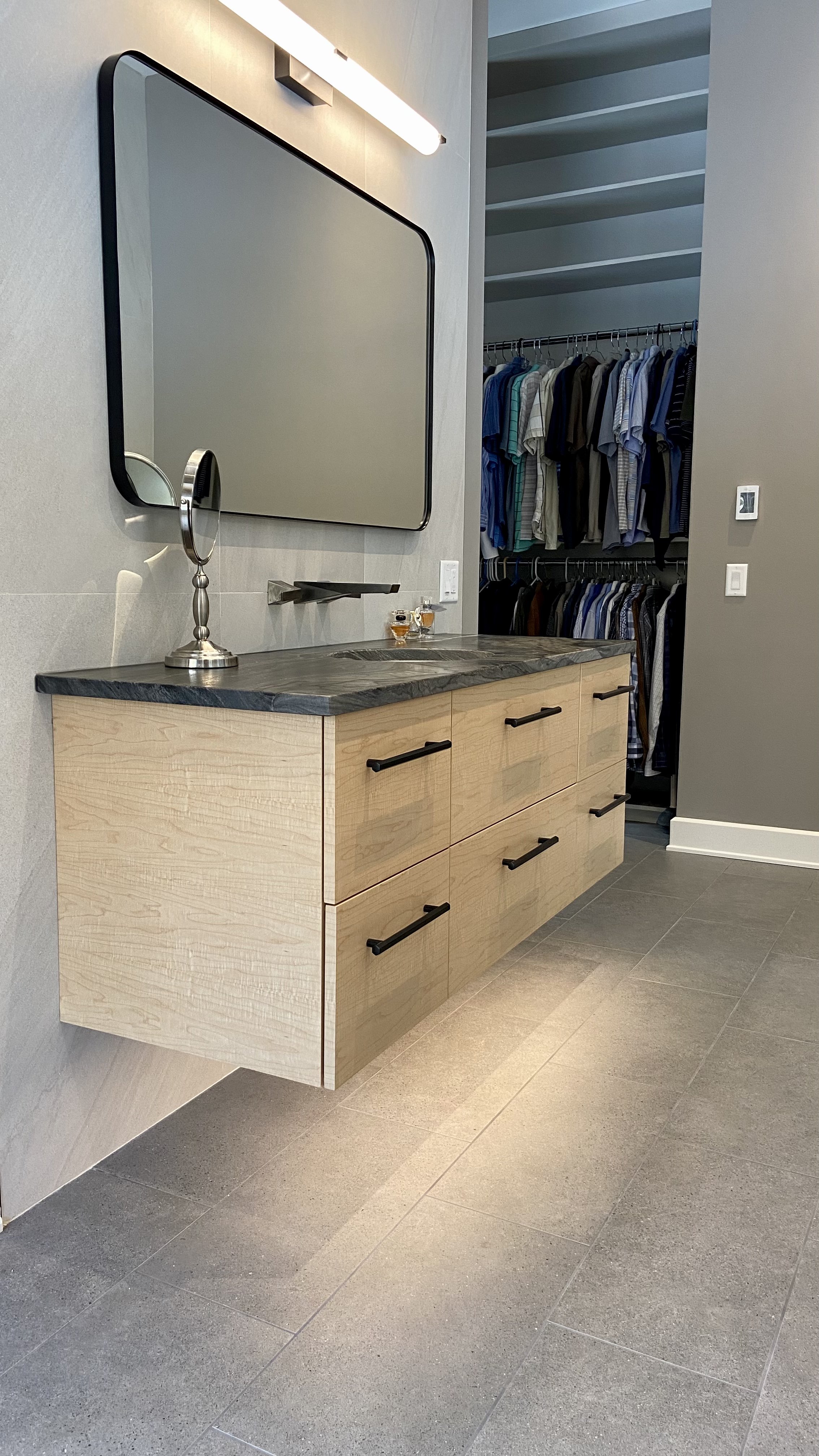Custom wood floating bathroom cabinet.