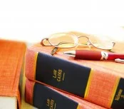 Law-Books-and-Glasses-174x153.jpg