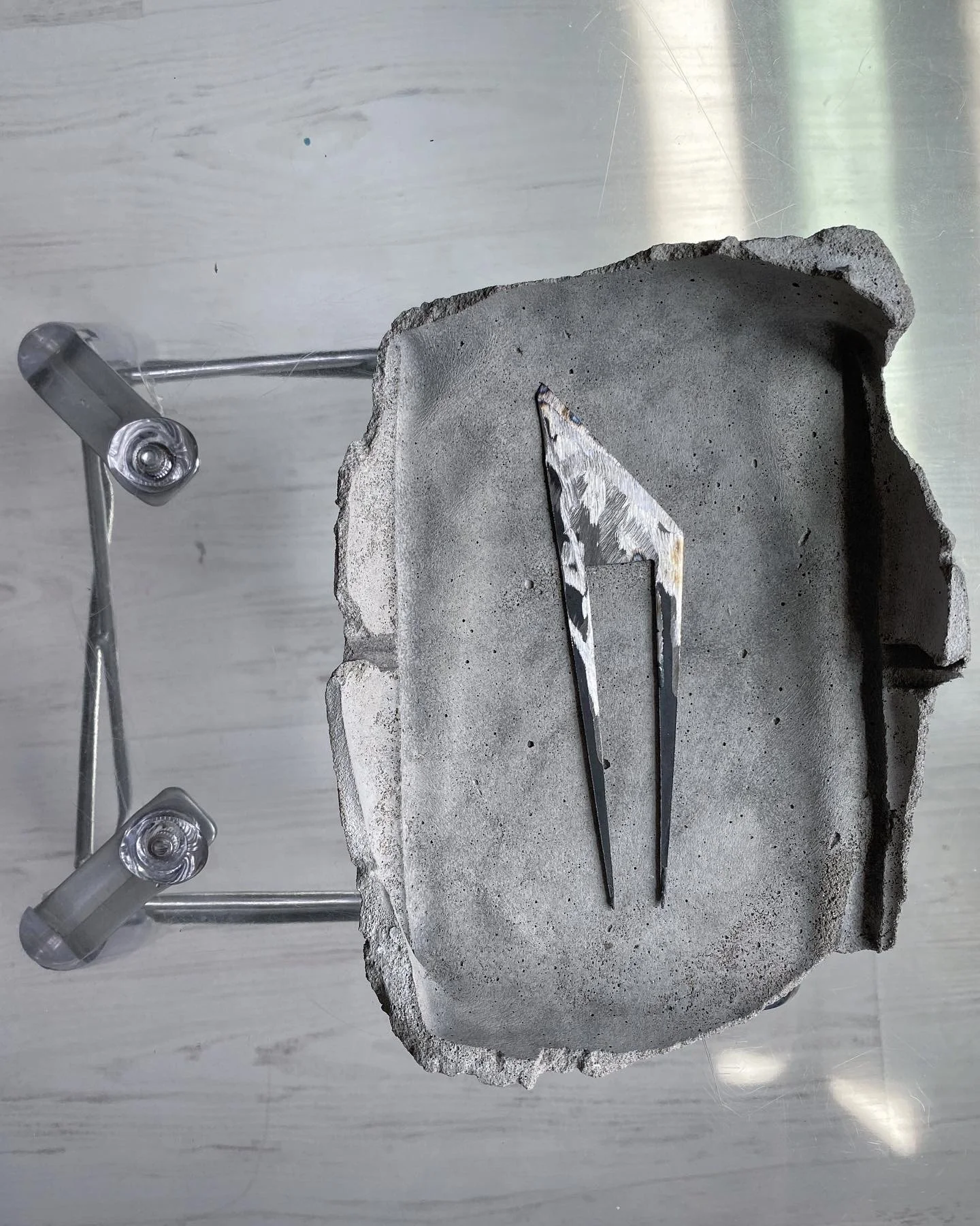  Steel hair pin and leather scalpel 