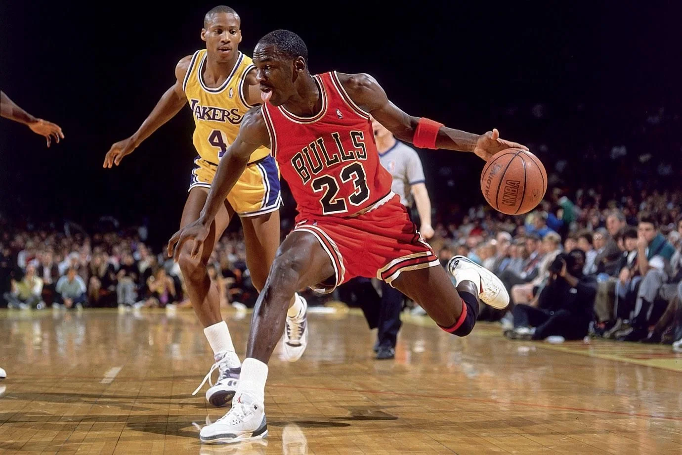 Michael Jordan fakes on a drive against the Los Angeles Lakers in February 1988. By Andy Hayt for Sports Illustrated