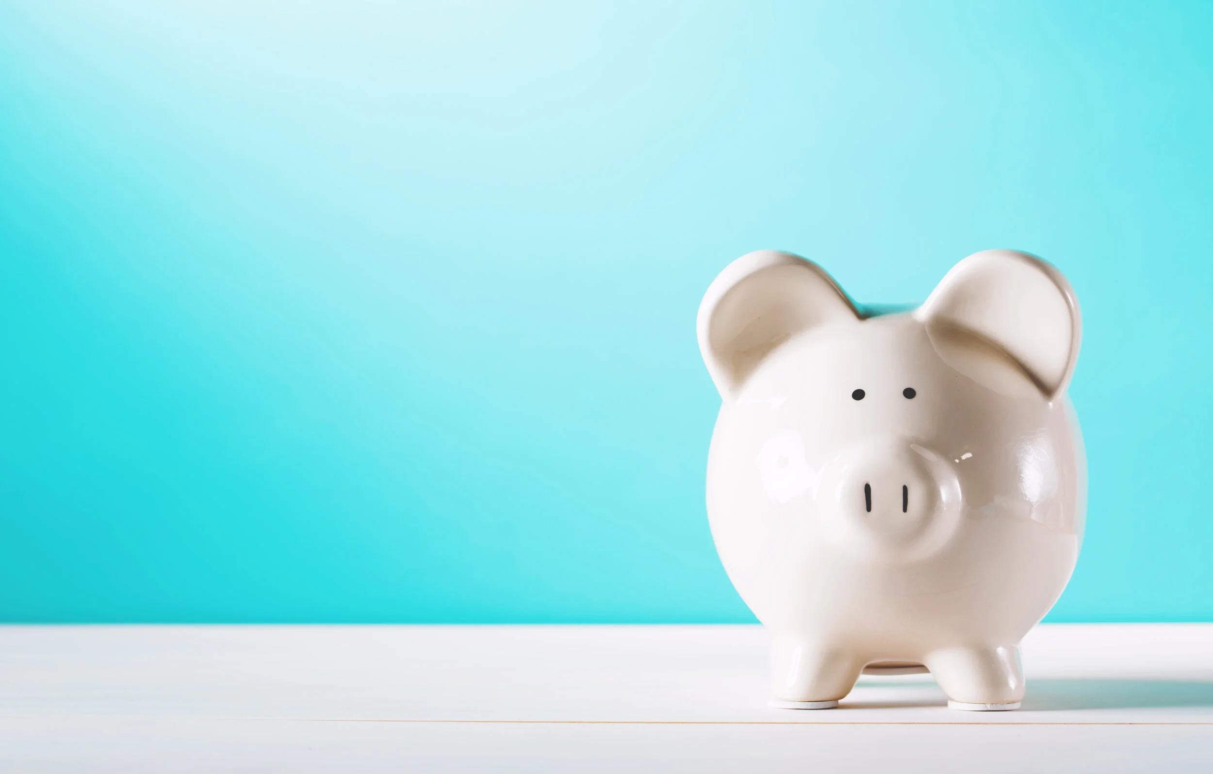 iStock-611183044-blue bg piggy.jpg