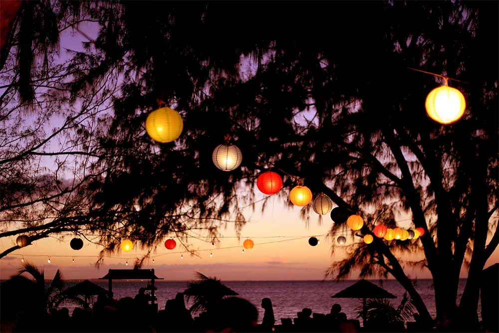 The Friday night beach party at the Caribbean Village’s Treasure Beach is a great place to watch the sunset over Grace Bay. Hanging paper lanterns make for a romantic scene.