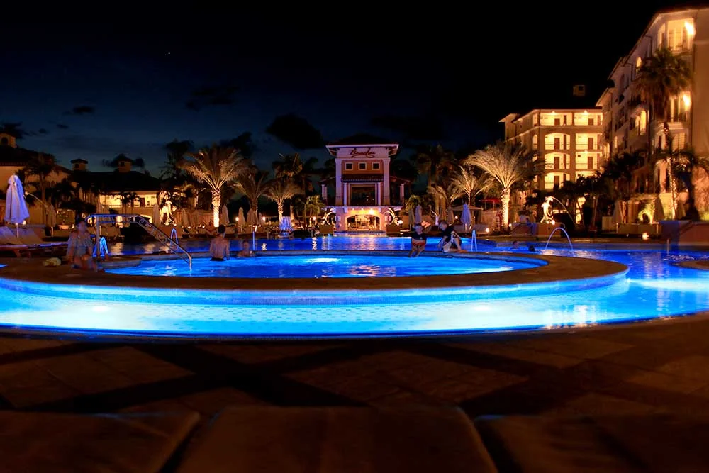 The Italian Village Pool is bustling by day, but it’s tranquil during the evening hours.