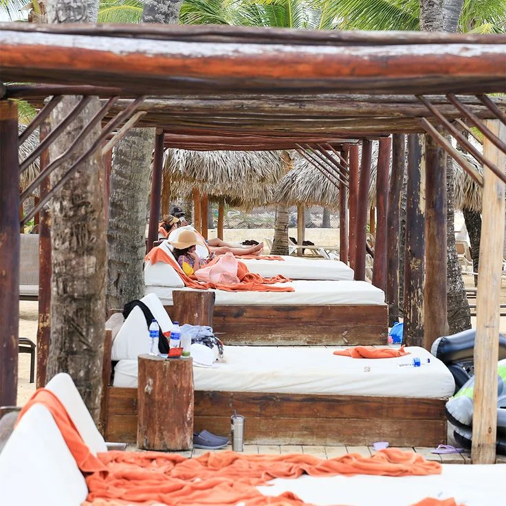 The cabanas at Dreams are literal beds, but the early beachgoer gets the mattress, as the saying goes.