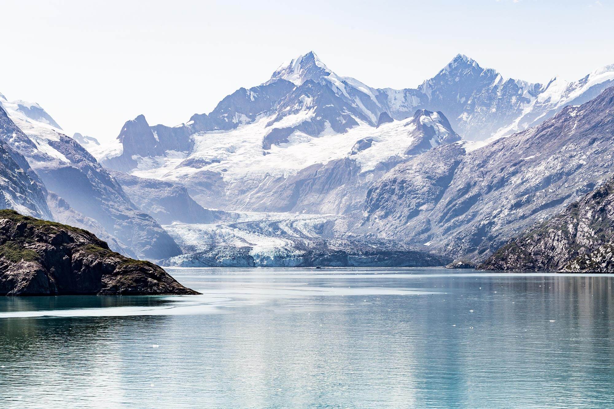 Passage aboard the Eurodam included a guided tour of Glacier Bay National Park. That tiny speck in front of the Johns Hopkins Glacier is a 19-deck cruise ship. Words and pictures don’t do Glacier Bay justice.