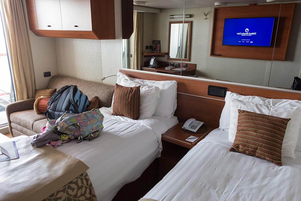 Our family stayed in a midship Verandah Stateroom on Deck 5. The loveseat converted into a full-size bed. This was convenient, but it made our balcony inaccessible at night.