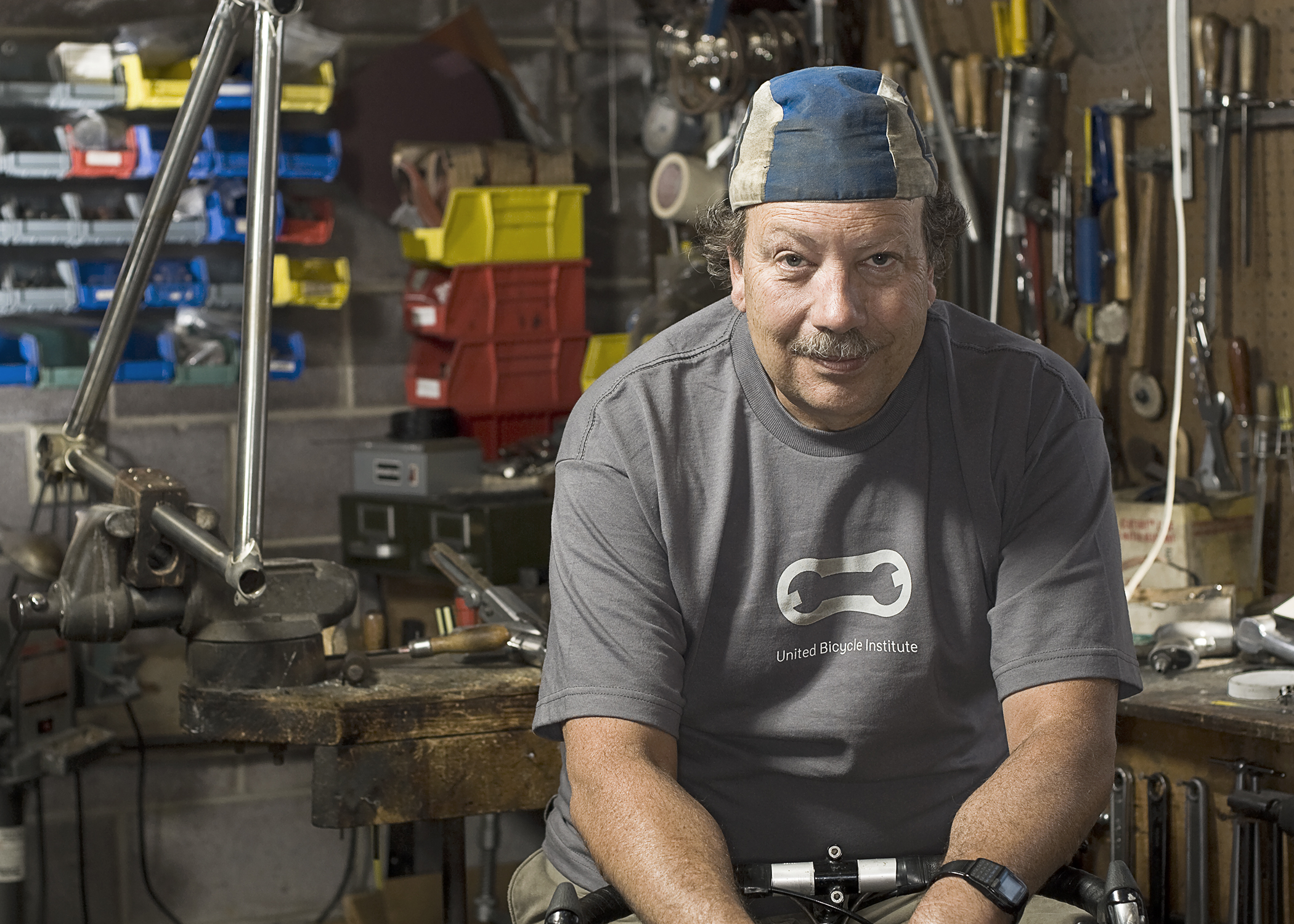 Mark and his Nobilette in his frame building shop for the My Favorite Bike Portrait Series.