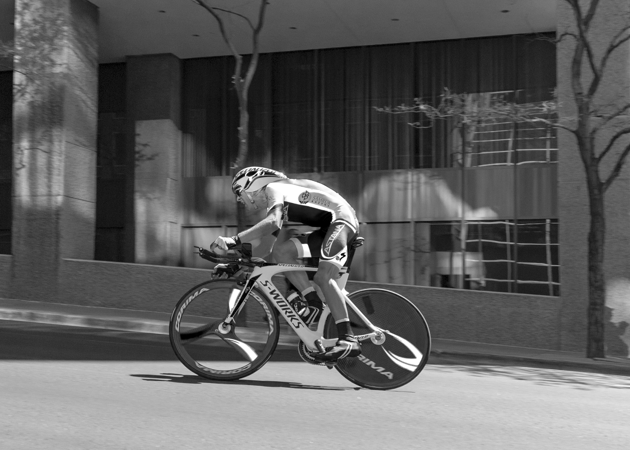  Astana team racer at speed during the individual Time Trail in  downtown Denver at the Tour of Colorado. 