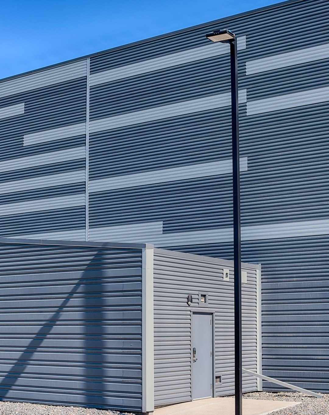 Corrugated: adjective - formed or shaped into wrinkles or folds or into alternating ridges and grooves.

I found this cool building in Boulder and immediately knew I had to photograph it. I was drawn to the texture, lines and angles.

Hey #architects