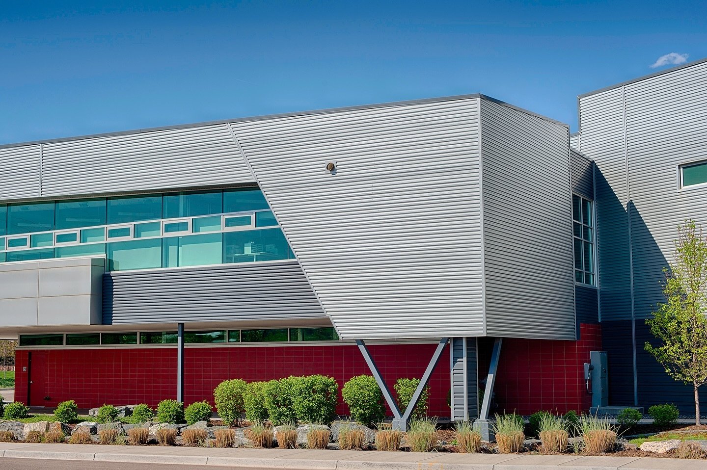 Corrugated: adjective - the act of shaping into parallel ridges and grooves.

I found this cool building in Boulder and immediately knew I had to photograph it. I was drawn to the texture, lines and angles.

Hey #architects, #builders, #developers an