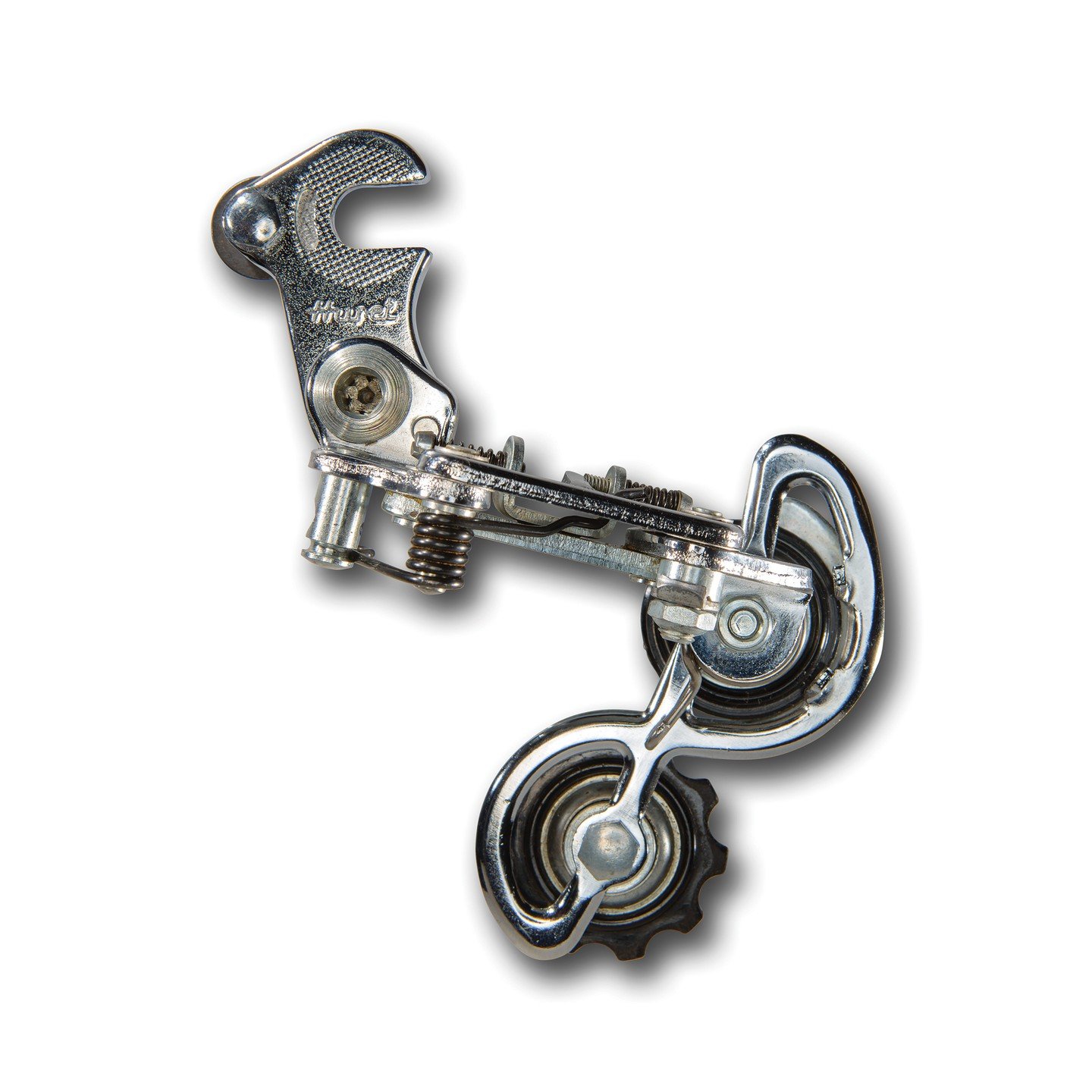 This is a Huret Svelto!

It's one of 2 Huret rear d&eacute;railleurs in the new and expanded edition of The D&eacute;railleur Project Book.

The Huret Svelto was first introduced in 1963. This is a later
production, first-generation model that featur
