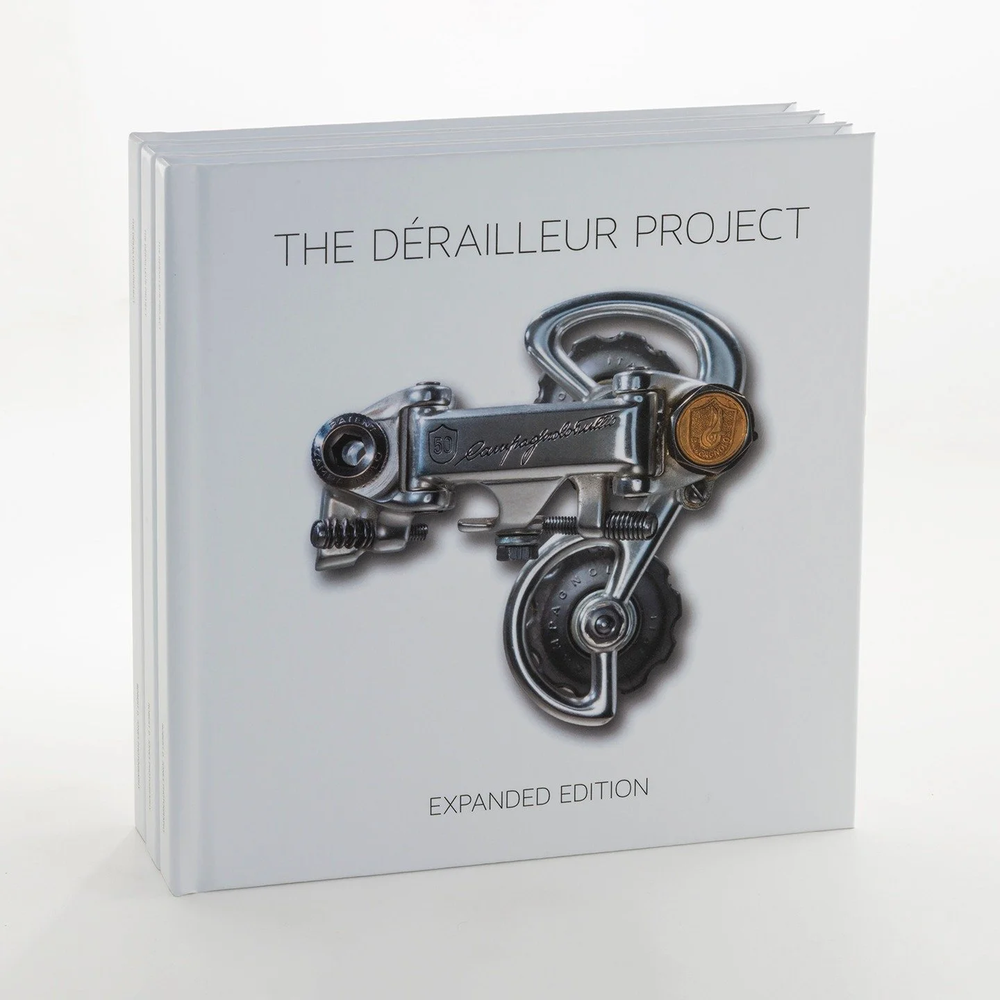 In honor of the 80th edition of the Vuelta a Espa&ntilde;a, The D&eacute;railleur Project Book is on sale!

Every book will be signed and will include a 4&rdquo;x 4&rdquo; print of the Mavic 840 SSC or the Ofmega Premier. Your choice of prints.

In h