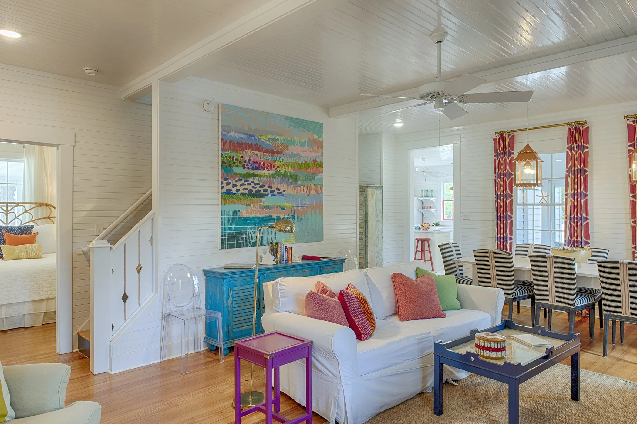 Living room interior at Bliss Cottage showing seating, natural light, and open gathering space.