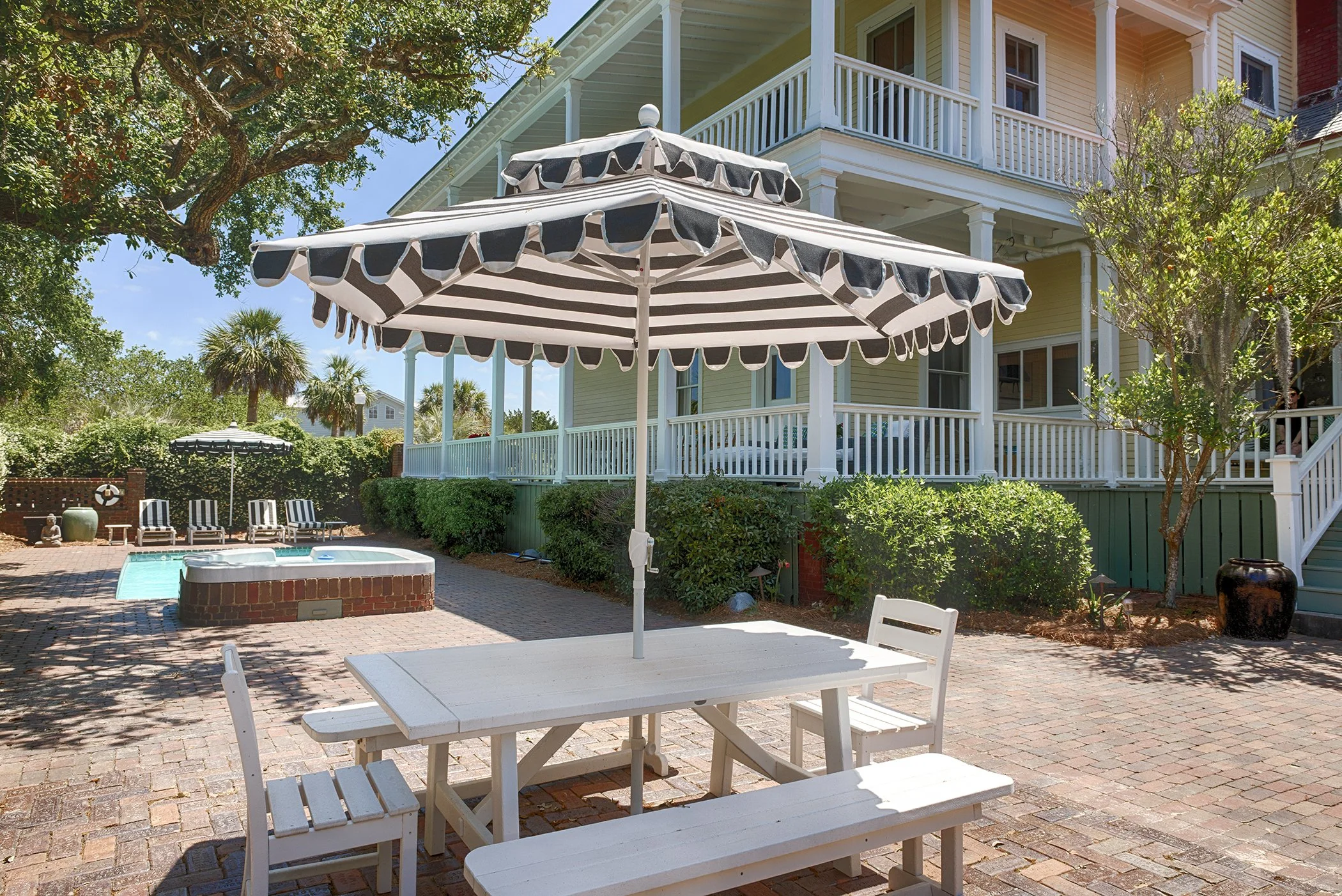 atio, porches, and pool area at the historic Officer’s Row vacation rental on Tybee Island.