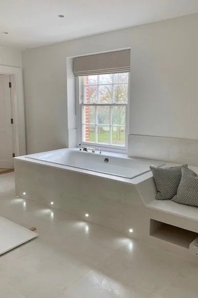  Master ensuite. View of custom moulded Corian bath top with bench seat. 