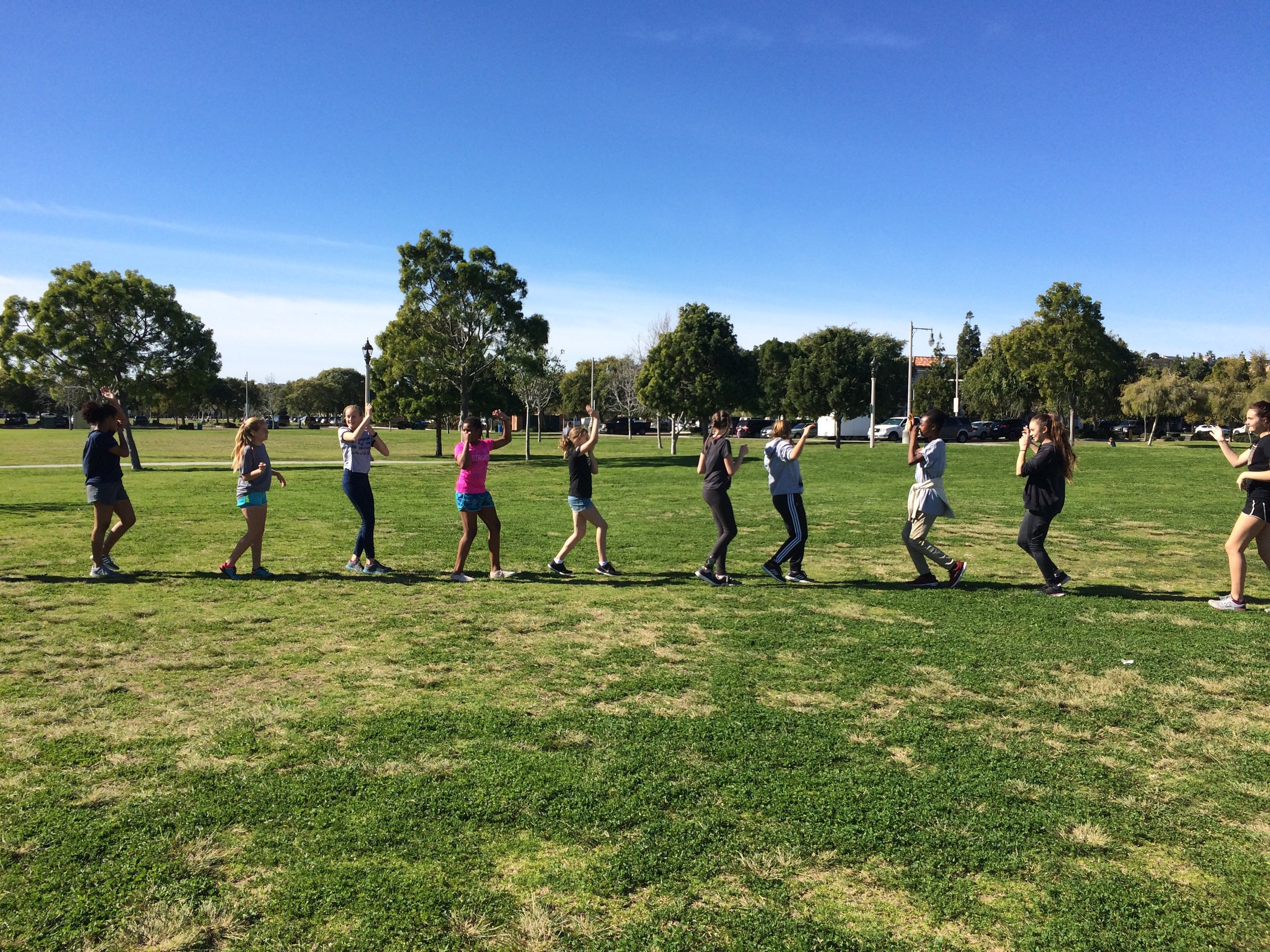 Tween girls empowerment through fun fitness in Liberty Station Park