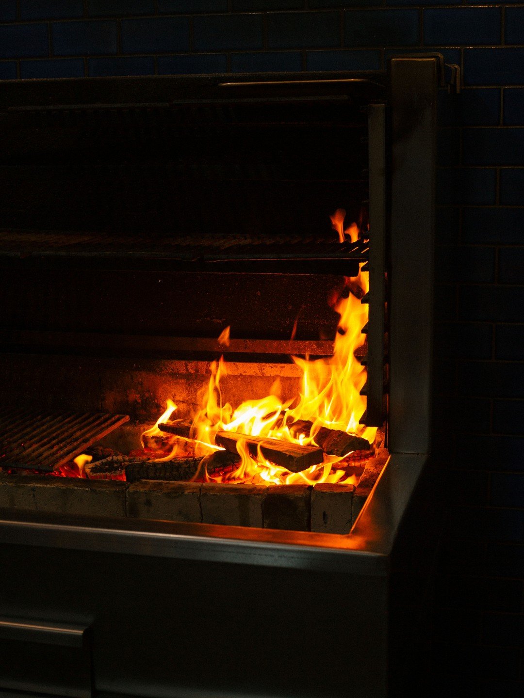 Open flame, elevated craft. Our intimate tasting menu experience comes together in the kitchen, where every dish takes shape before your eyes.