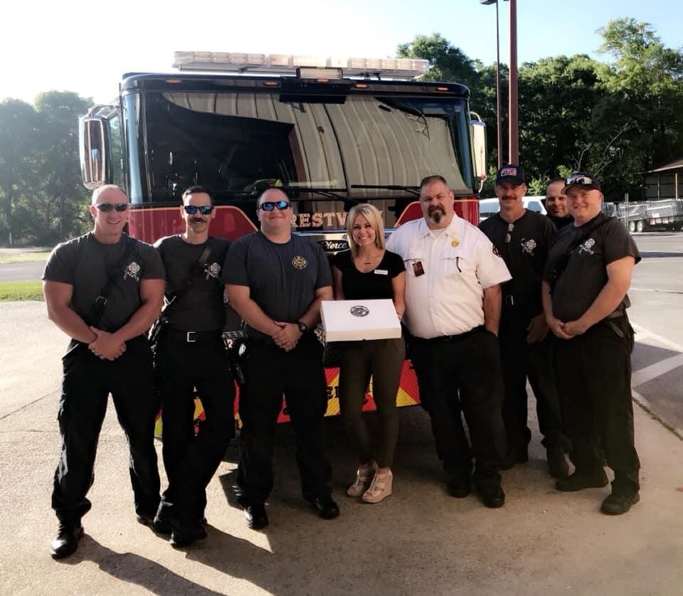 giving donuts to firefighters.JPG