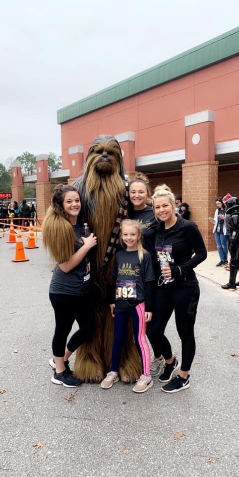 Okaloosa Team posing with Chubaka.JPG