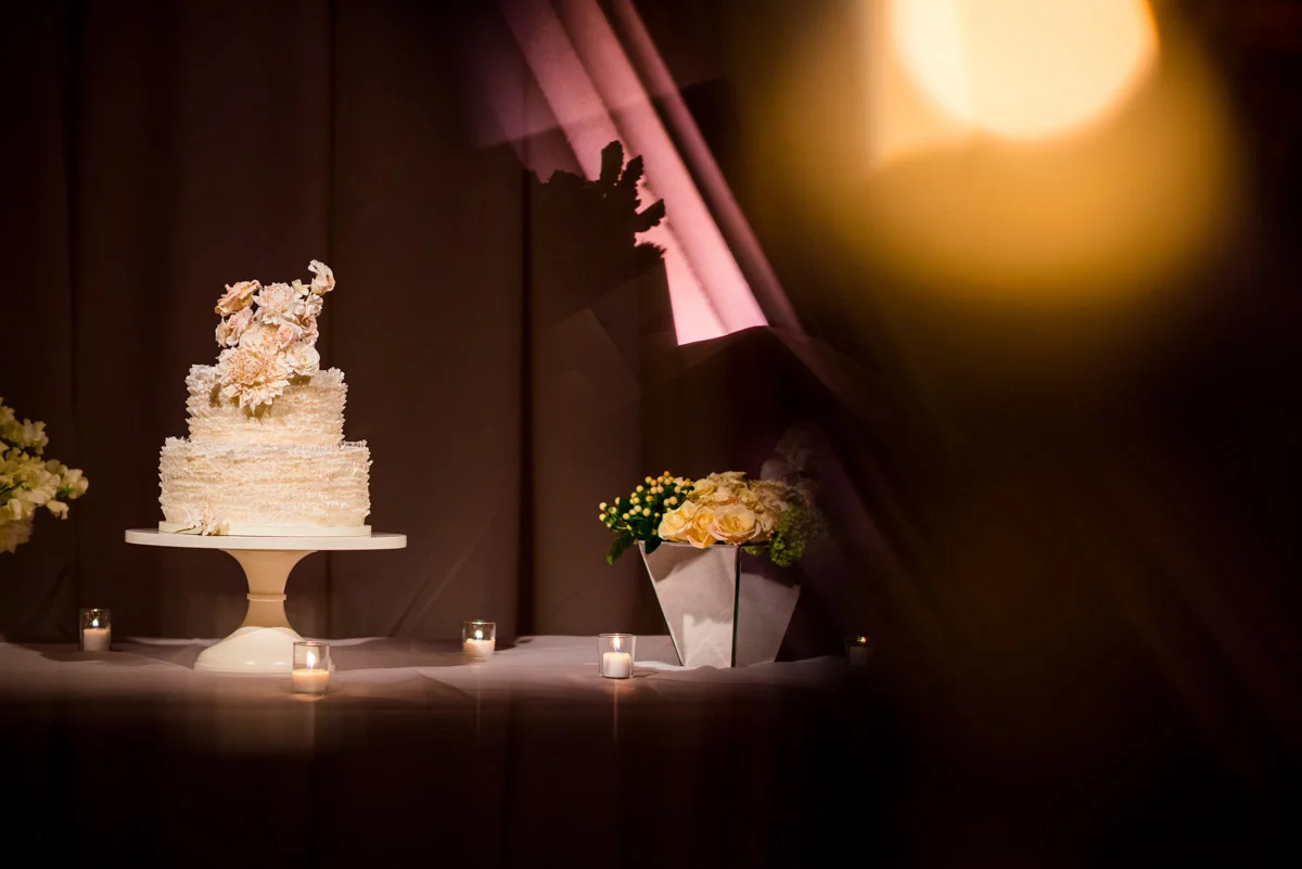 White wedding cake with ruffles and sugar flowers the Corcoran Gallery of Art in Washington DC, Planning by Bella Notte, Photo by Michelle Lindsay Photography